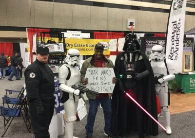 Owner Ron Bowie enjoying the DFW Auto Show with characters from Star Wars
