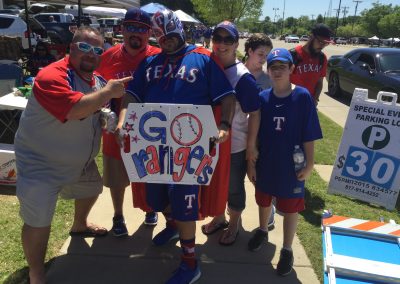 More Texas Rangers fans celebrating with collapsible white boards by Hey You! Signs.